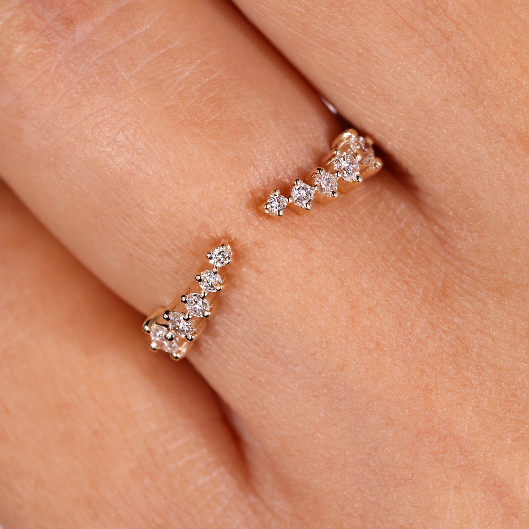 Round diamond wedding band in yellow gold.