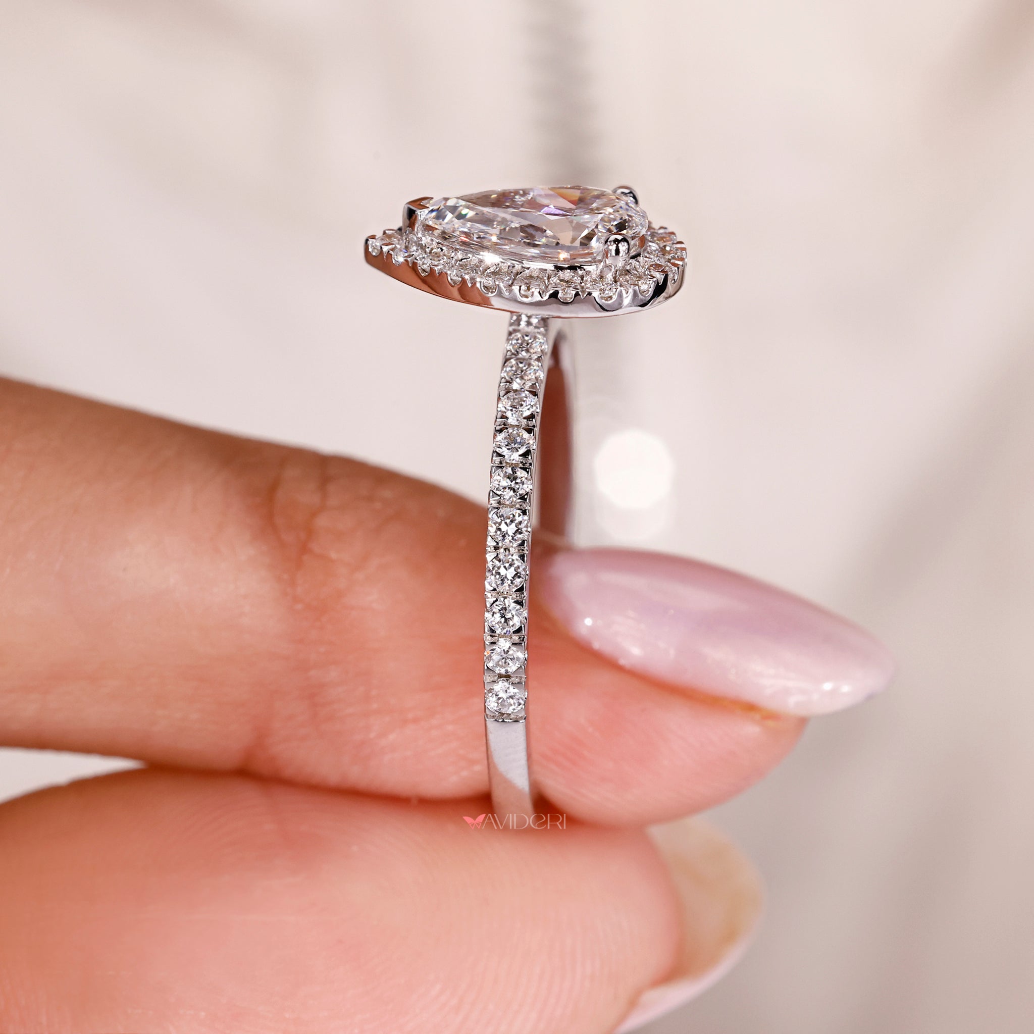 Pave ring setting with handmade white gold band.