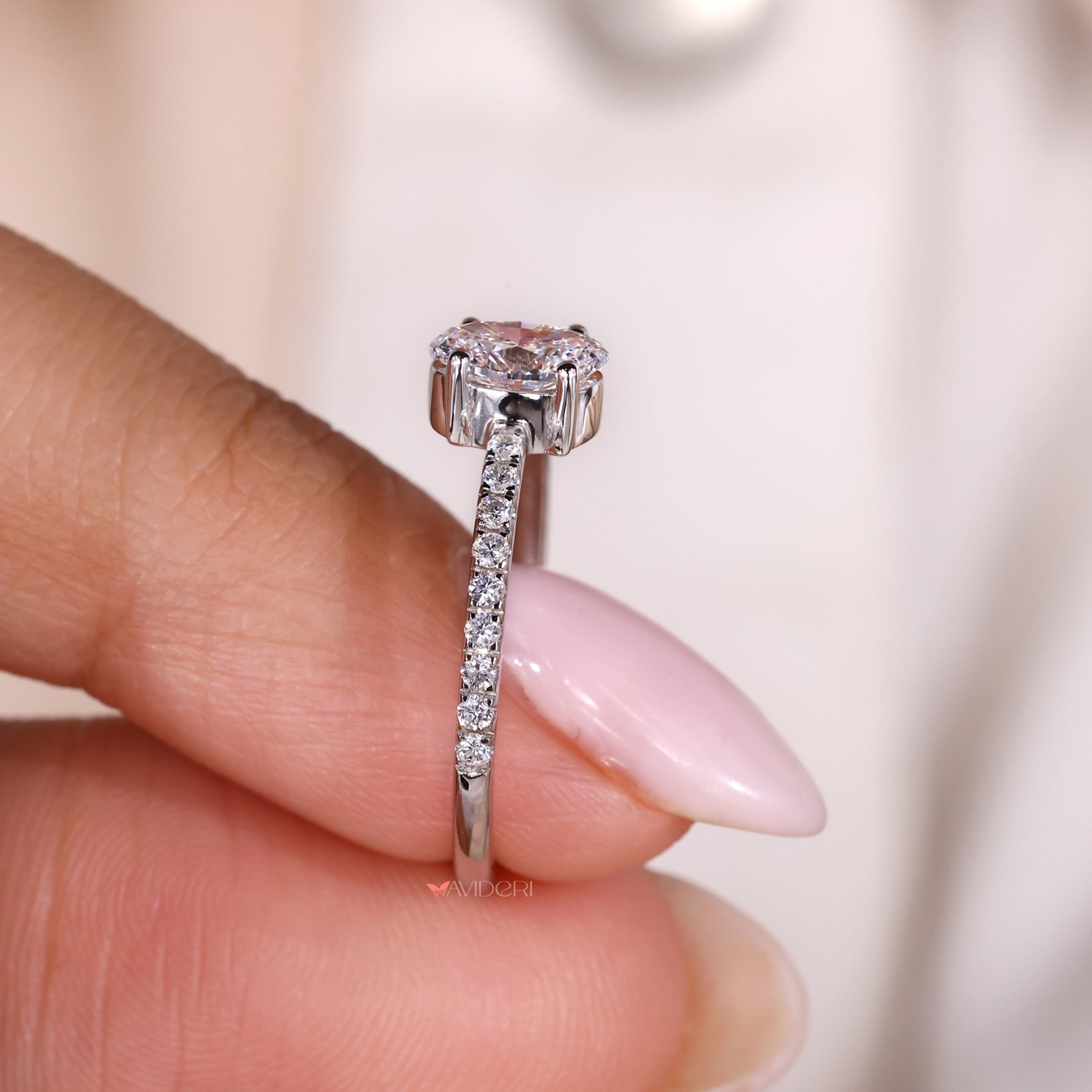 IGI certified oval shaped engagement ring with a flawless design.