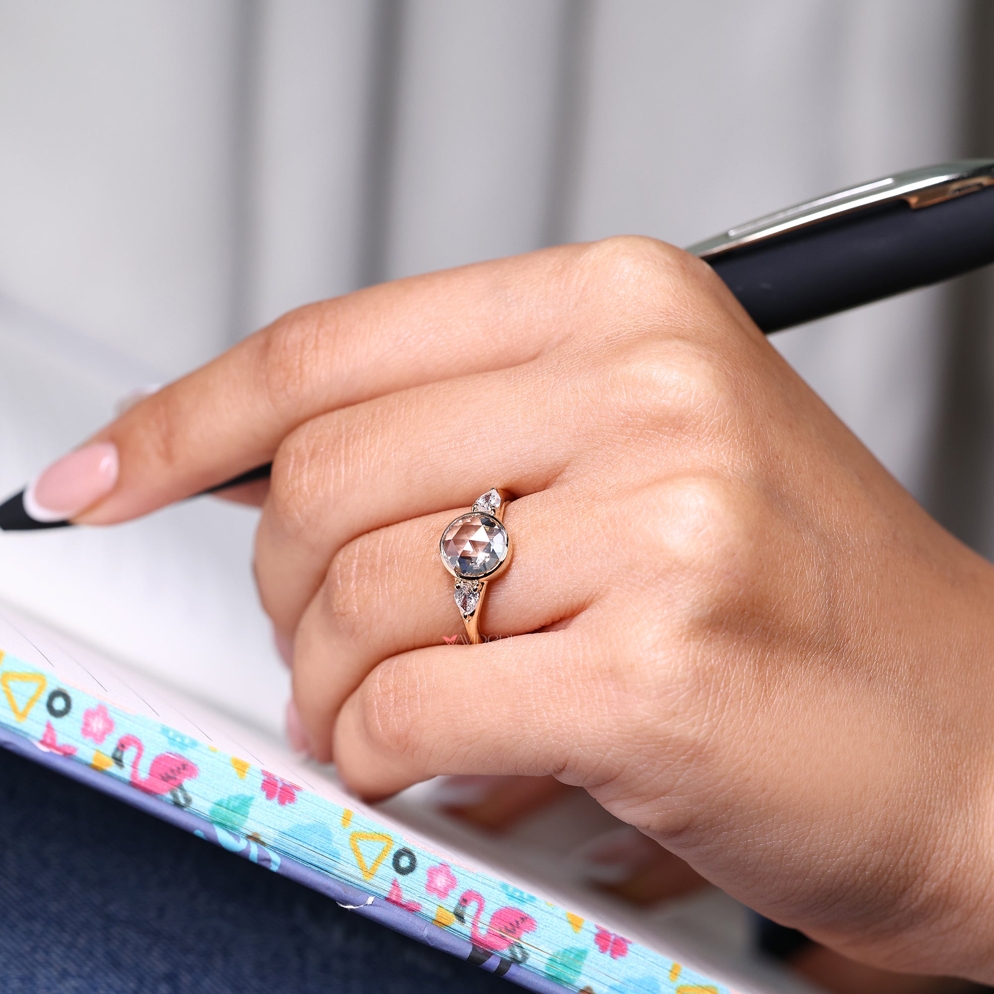 3 stone engagement ring in round rose cut diamond ring.