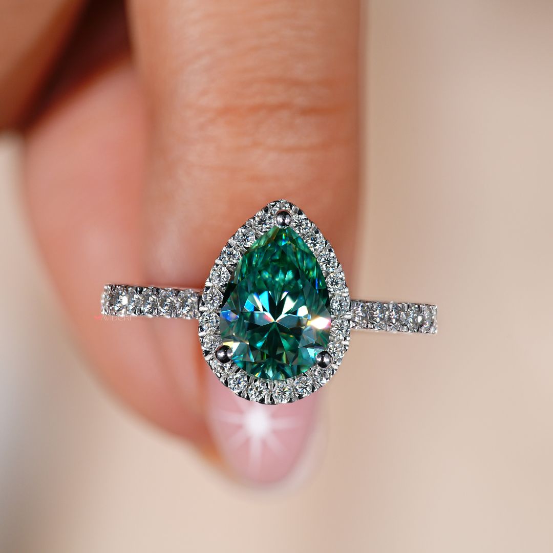 Elegant pear shaped engagement ring with timeless beauty.