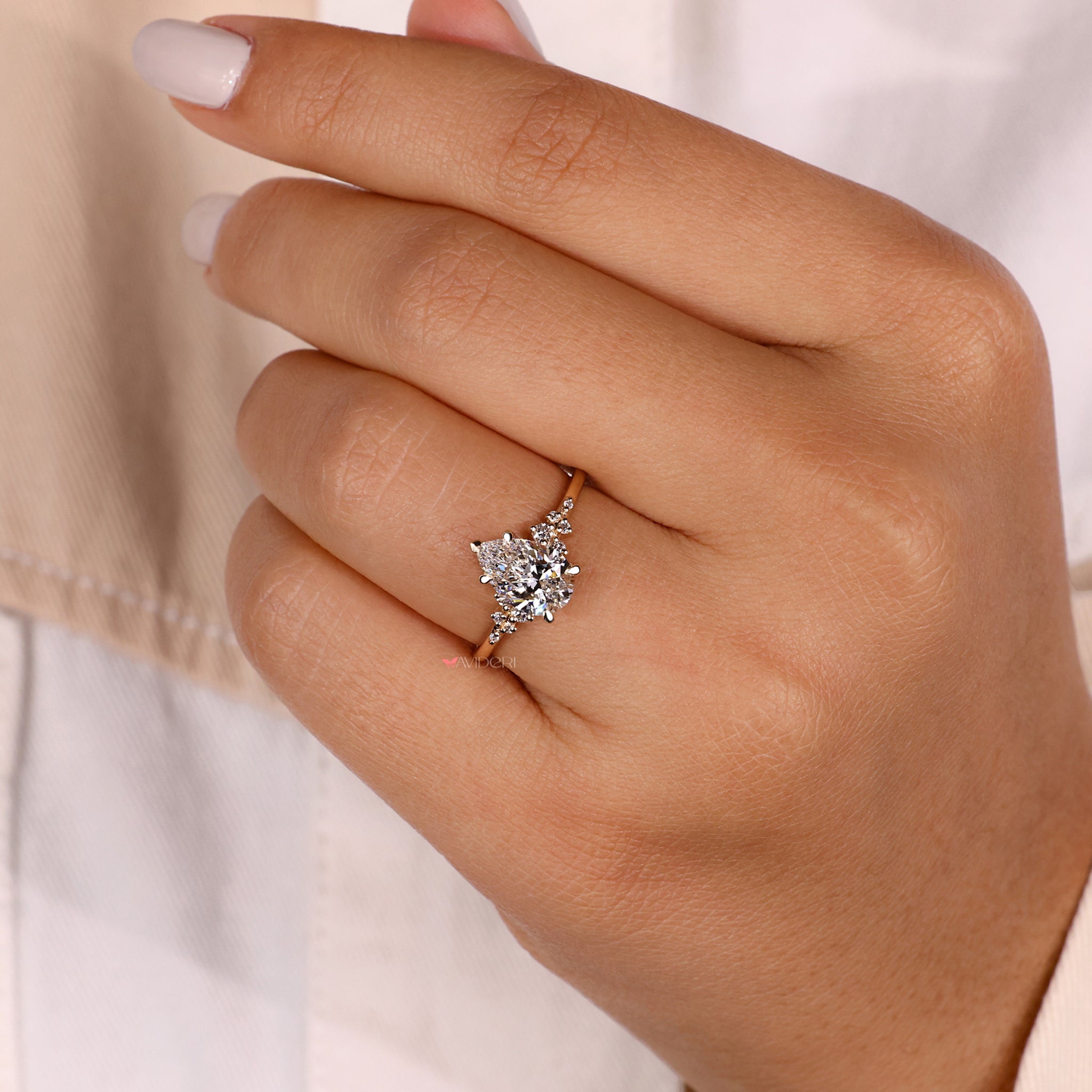 Pear ring in a handmade ring design.