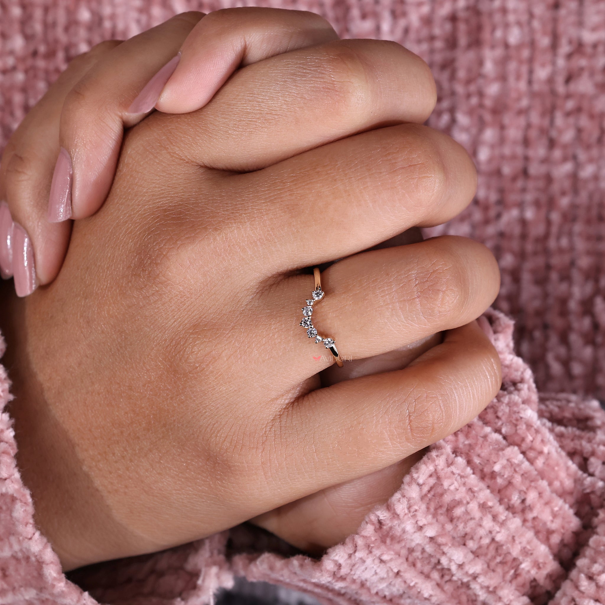 Round diamond prong setting for a secure and classic look.