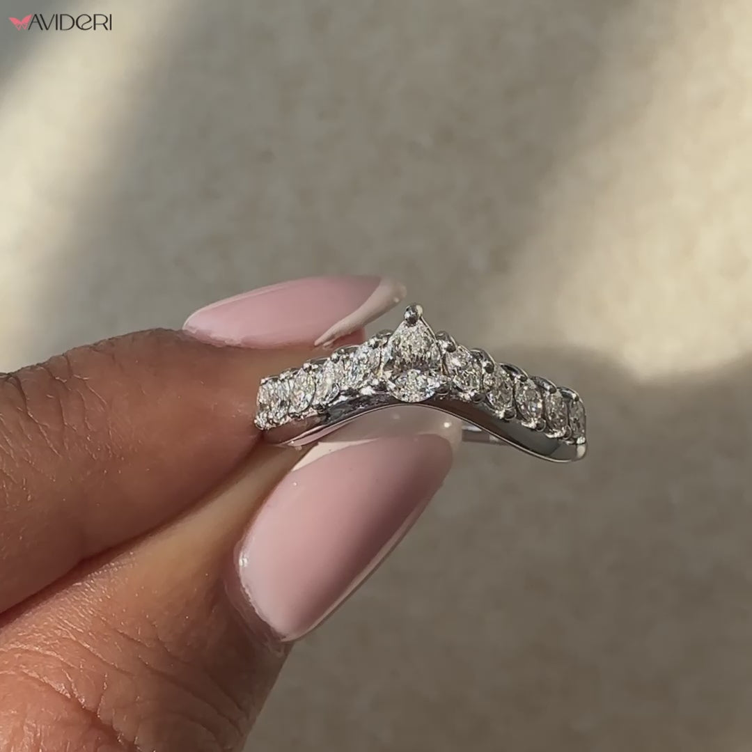 Marquise and pear diamond design for added brilliance.
