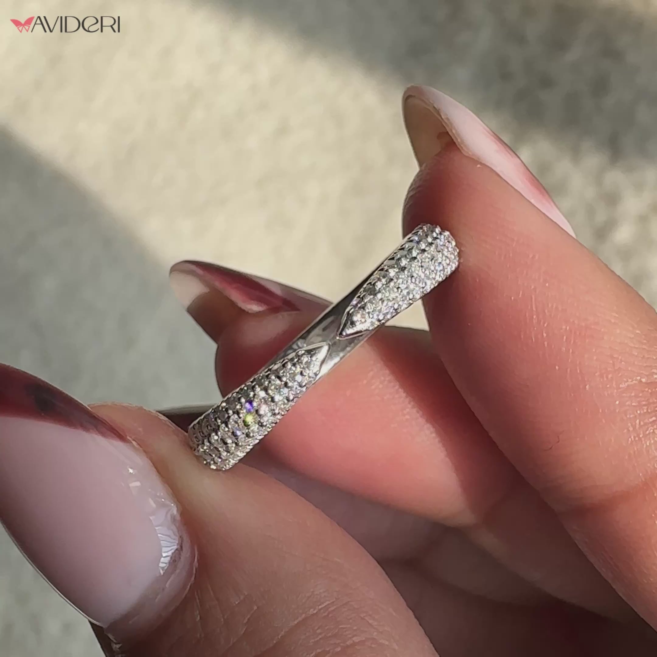 Open gap wedding band in white gold.