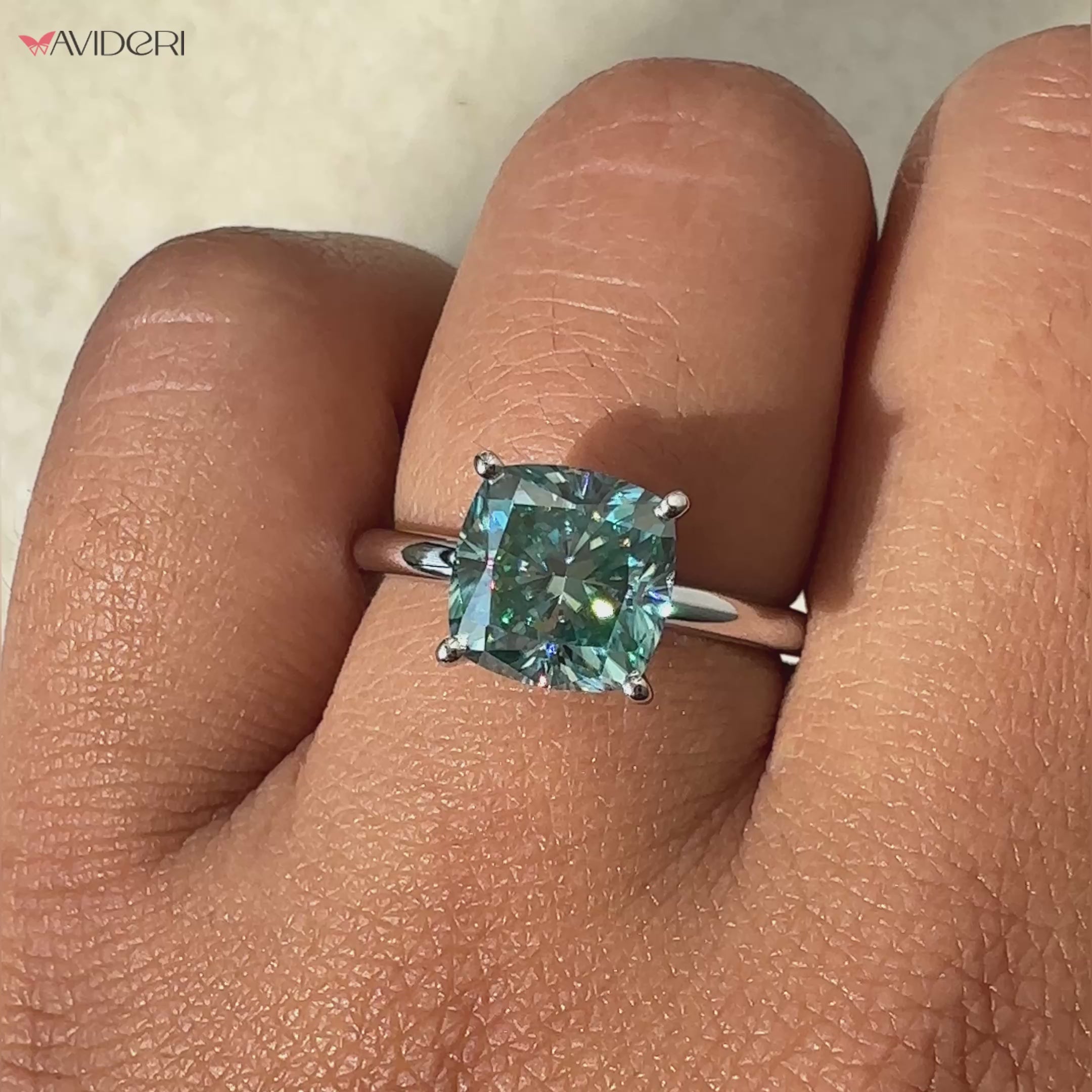 4 prong ring setting with a dazzling cushion cut diamond for added brilliance.