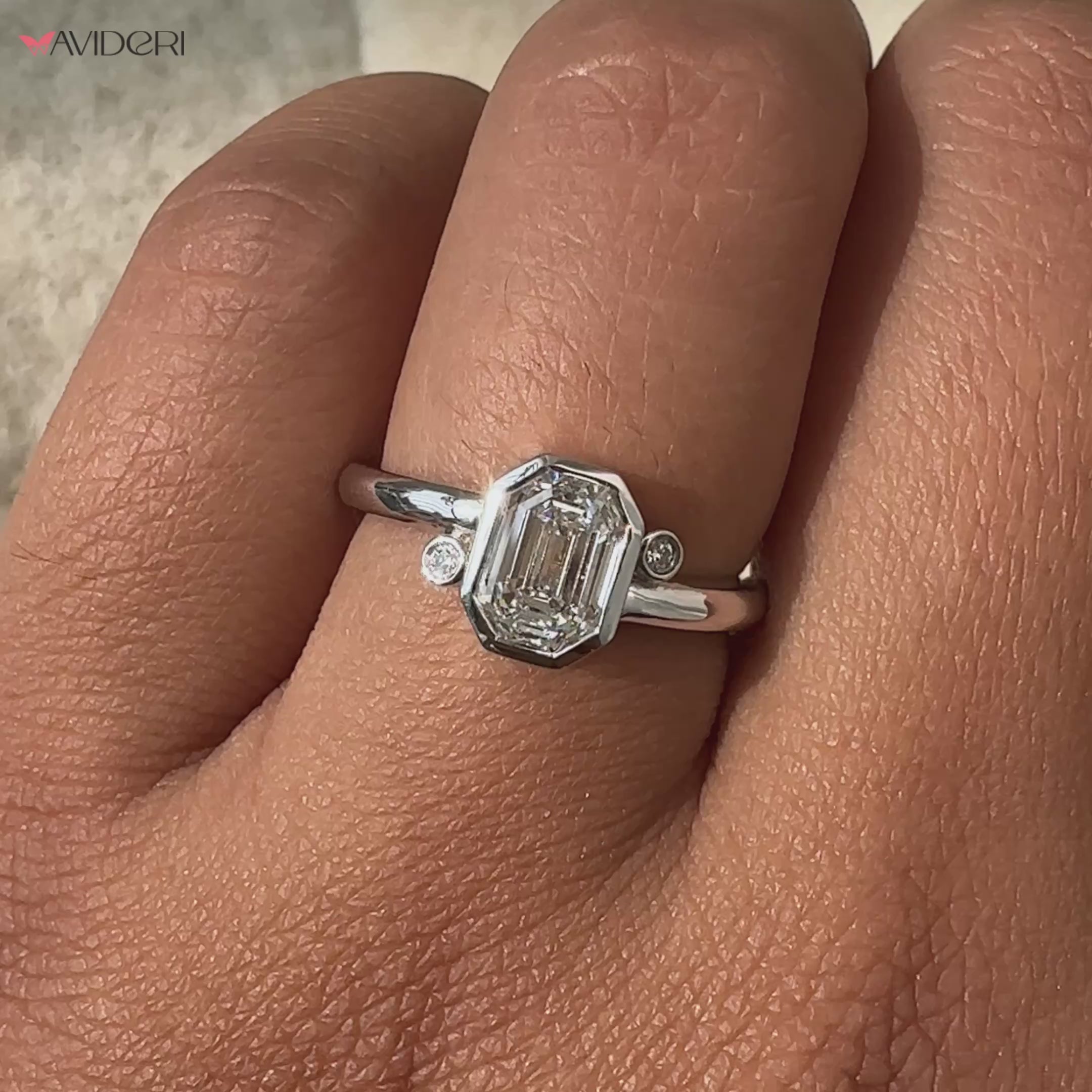Elegant emerald engagement ring showcasing timeless beauty.