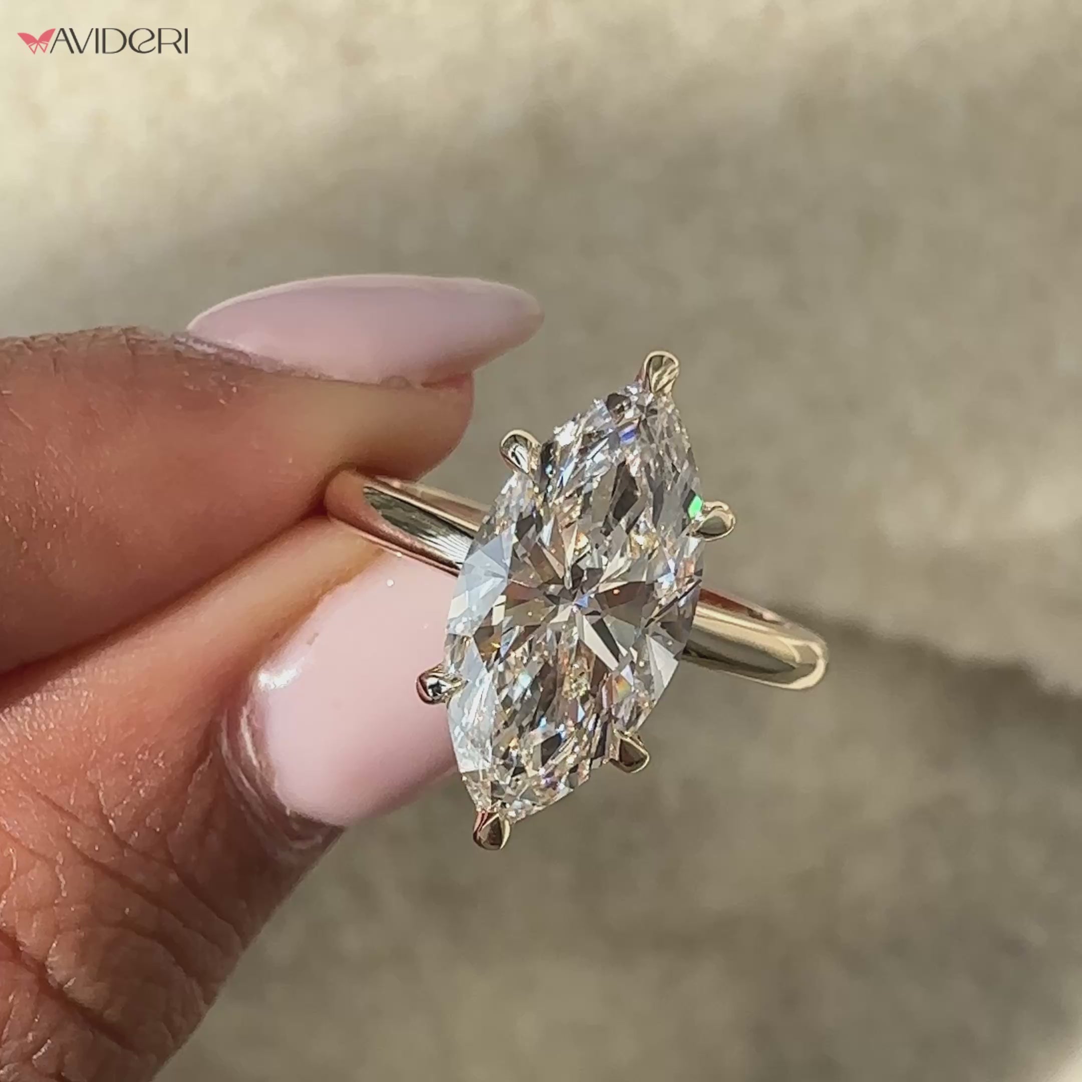 Marquise ring featuring a brilliant Marquise diamond.