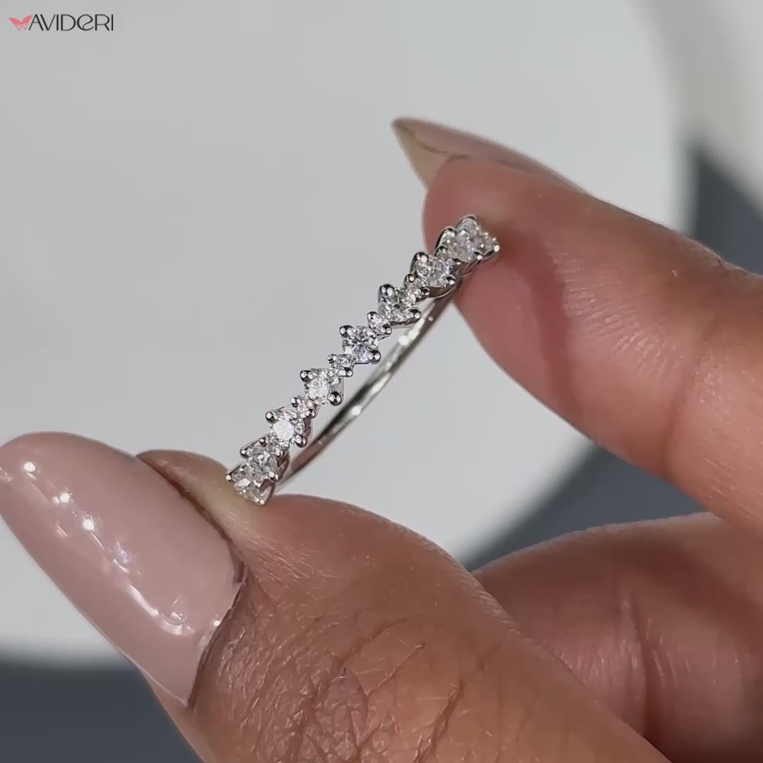 Elegant half eternity wedding band with continuous diamonds for a perfect fit.