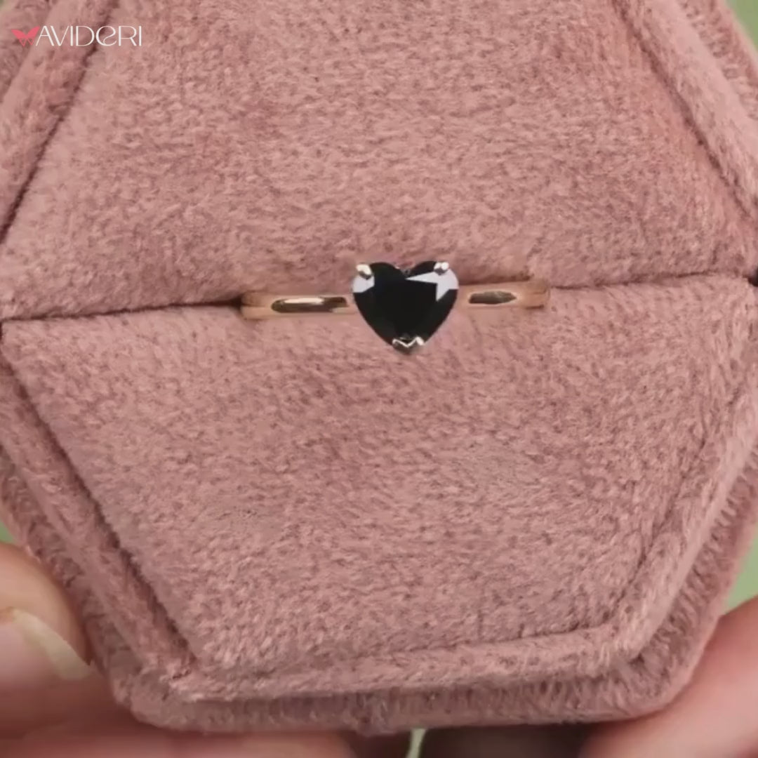 Cathedral setting ring combining tradition with a unique heart cut
