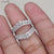 A Moissanite gold wedding band combines warmth and shine.