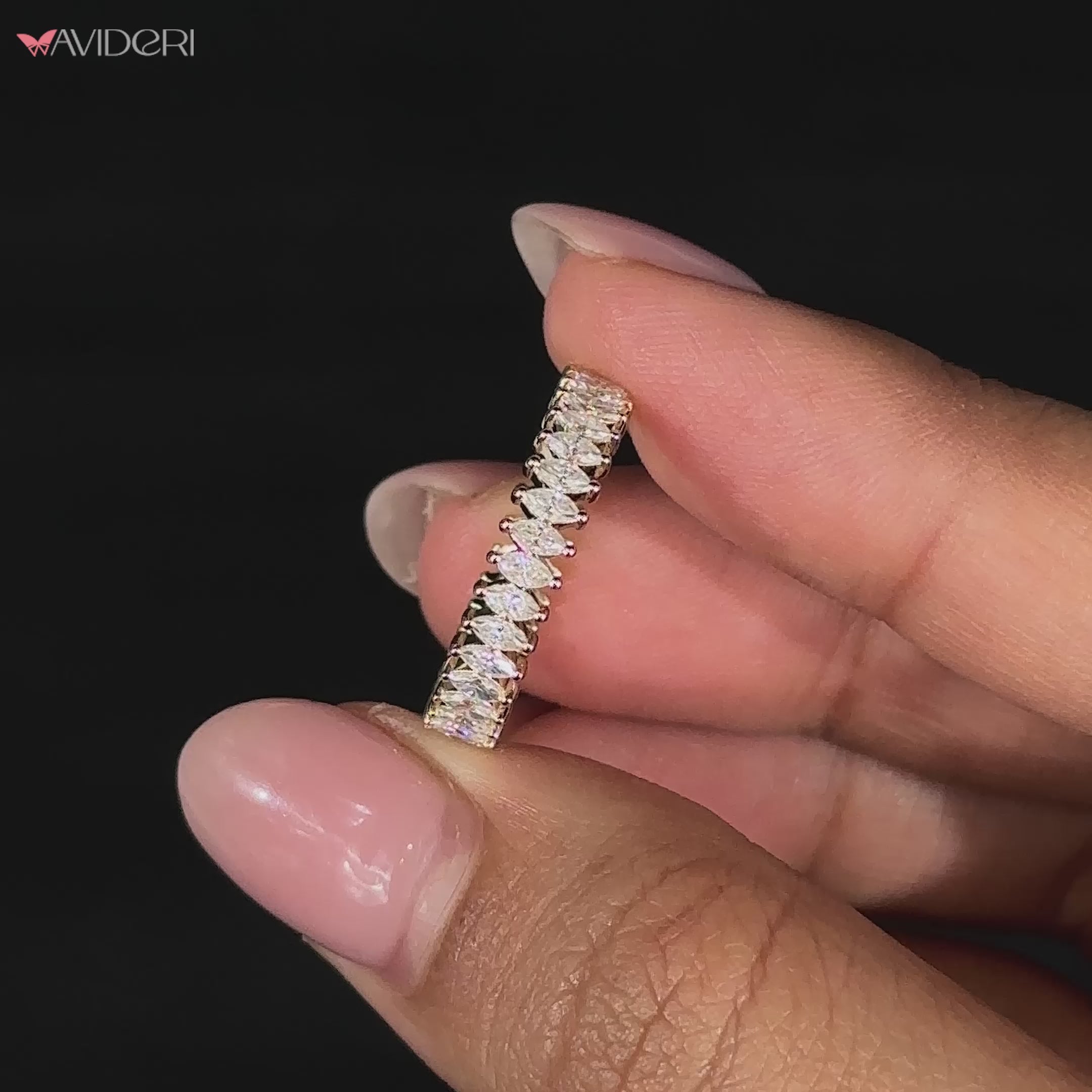 Prong set diamond band showcasing brilliant diamonds.