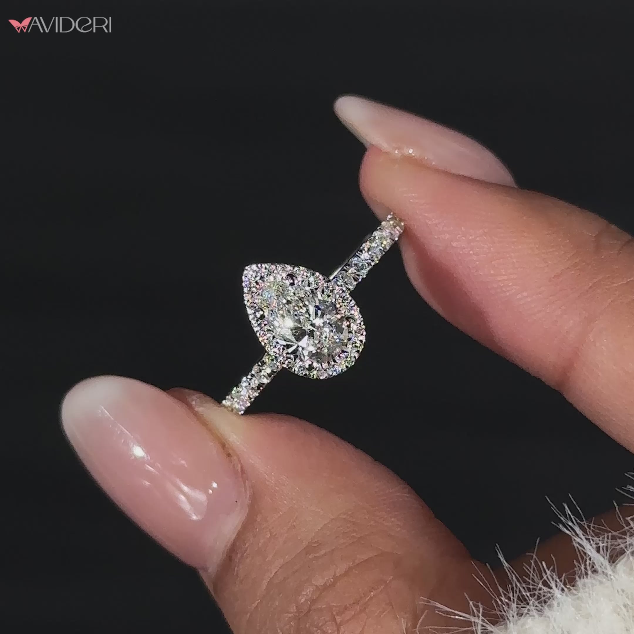 Stunning pear shaped engagement ring perfect for celebrating love and commitment.