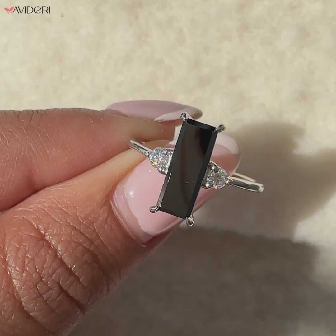Baguette cut engagement ring with a classic prong setting
