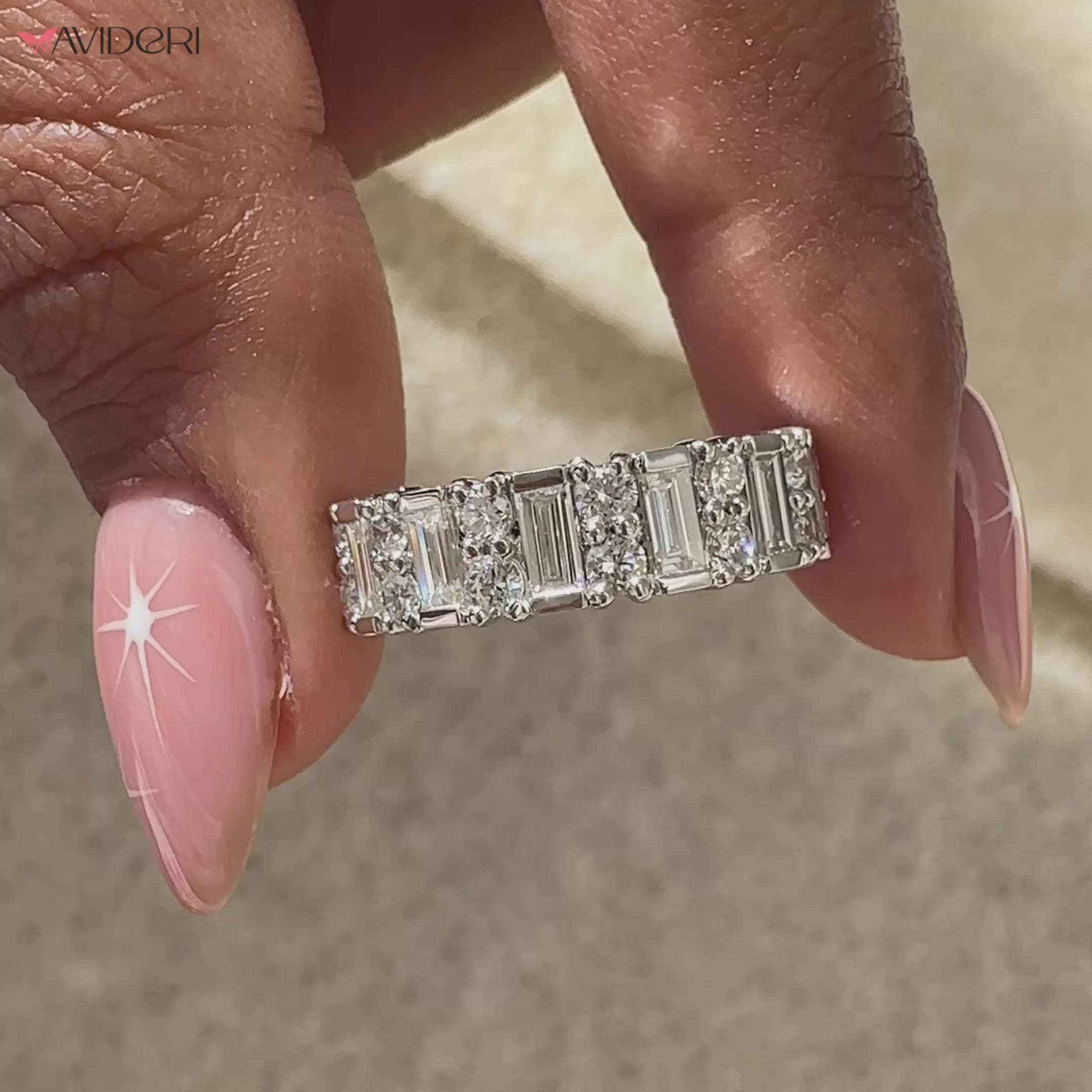 Vintage style wedding ring set with round diamond and baguette band.