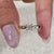 Lab grown diamond engagement ring with a princess diamond, set securely in a four-prong setting.