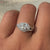 Pear shaped engagement ring with an IGI-certified stone.