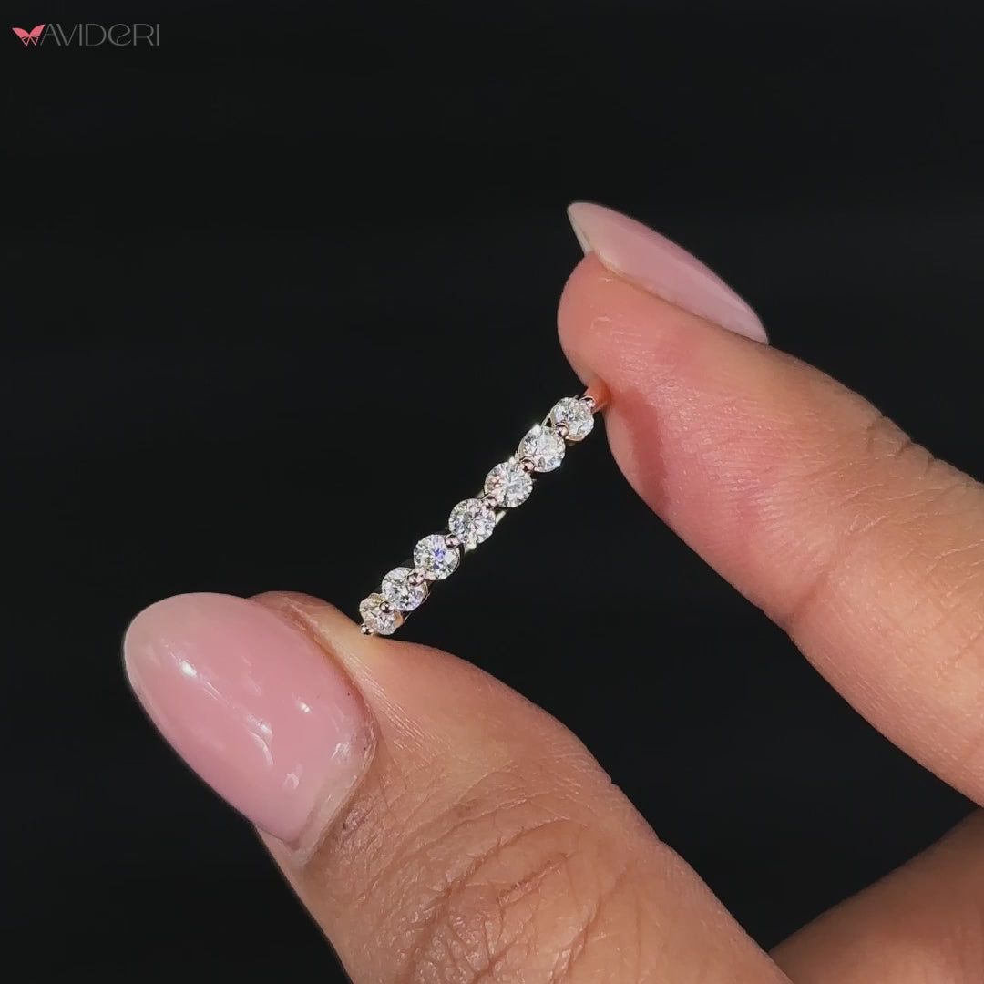 Beautiful 8 diamond wedding band in a classic low setting.