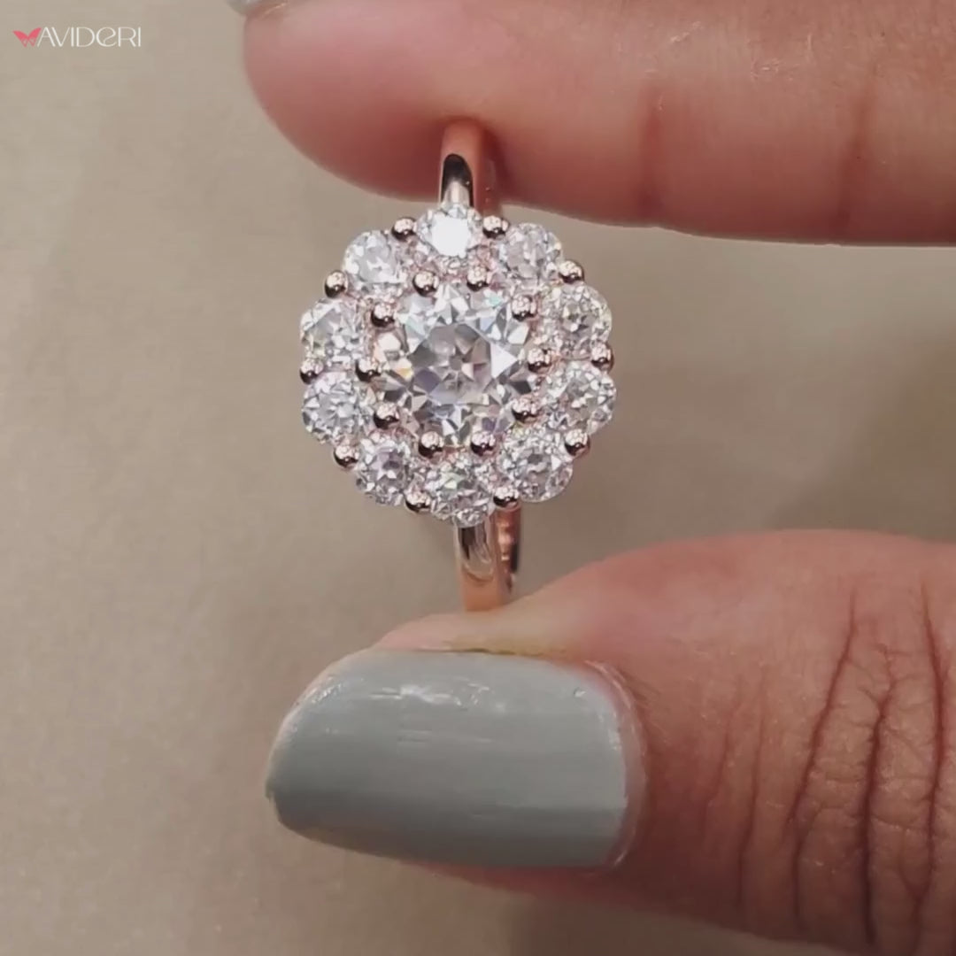 Cluster halo wedding ring featuring a unique cluster design.
