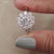 Cluster halo wedding ring featuring a unique cluster design.