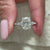 Avideri engagement ring matched in 5 stone diamond ring.