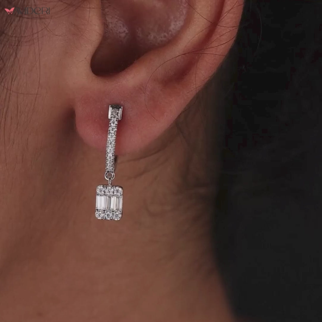 Birthday gifts for her featuring stunning baguette cut Moissanite drop earrings.