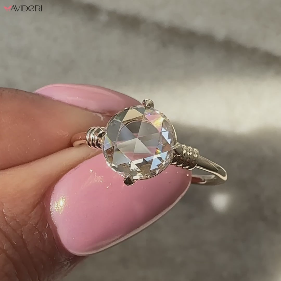 Round cut diamond ring with a rose cut ring for a modern twist.