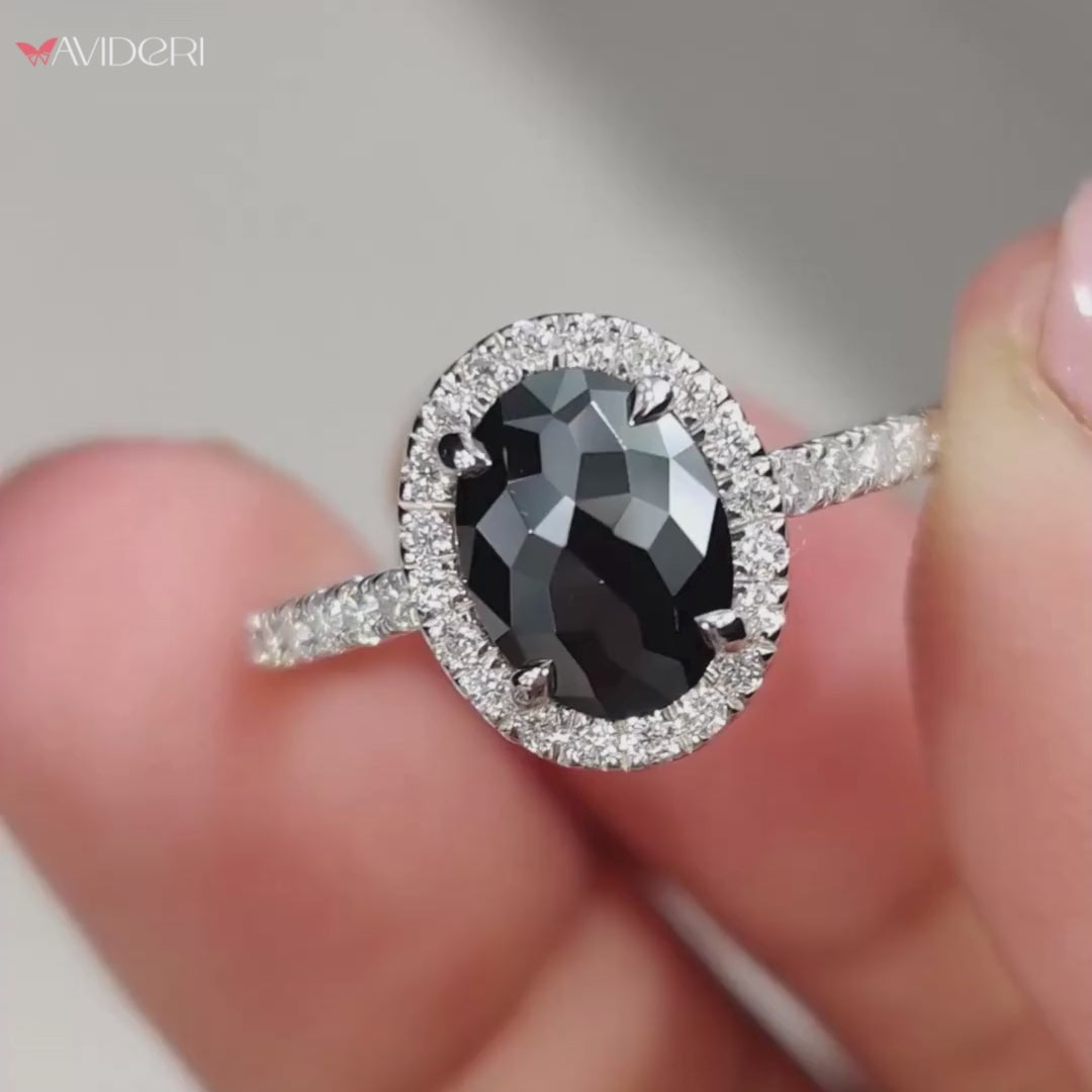 Oval engagement ring with moissanite in a classic halo ring setting.