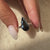 Elegant Pear Cut Engagement Ring with sparkling diamonds.