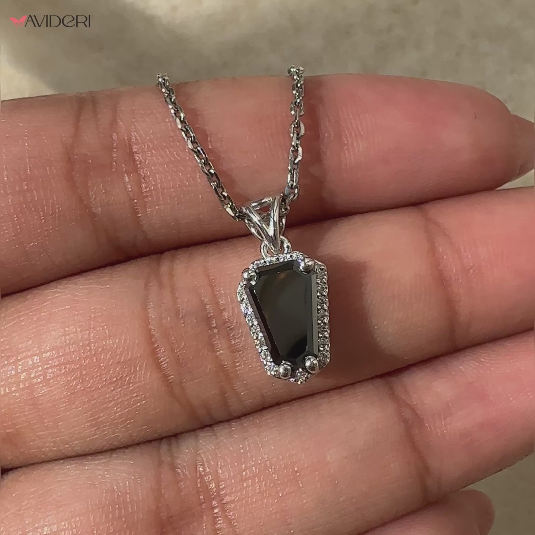Coffin pendant with a custom moissanite pendant for elegance.