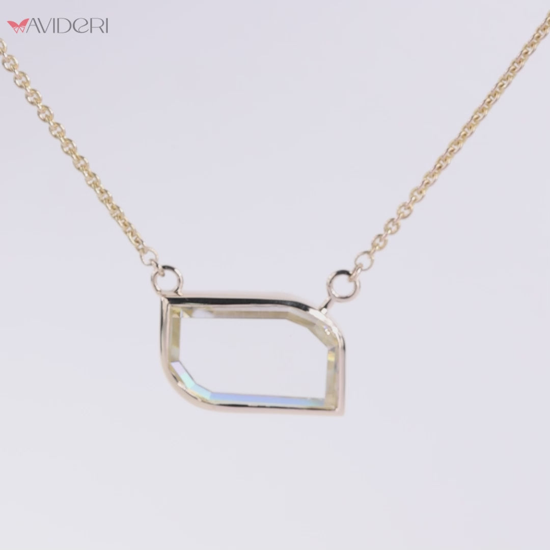 Yellow gold pendant adds warmth and luxury to every outfit.