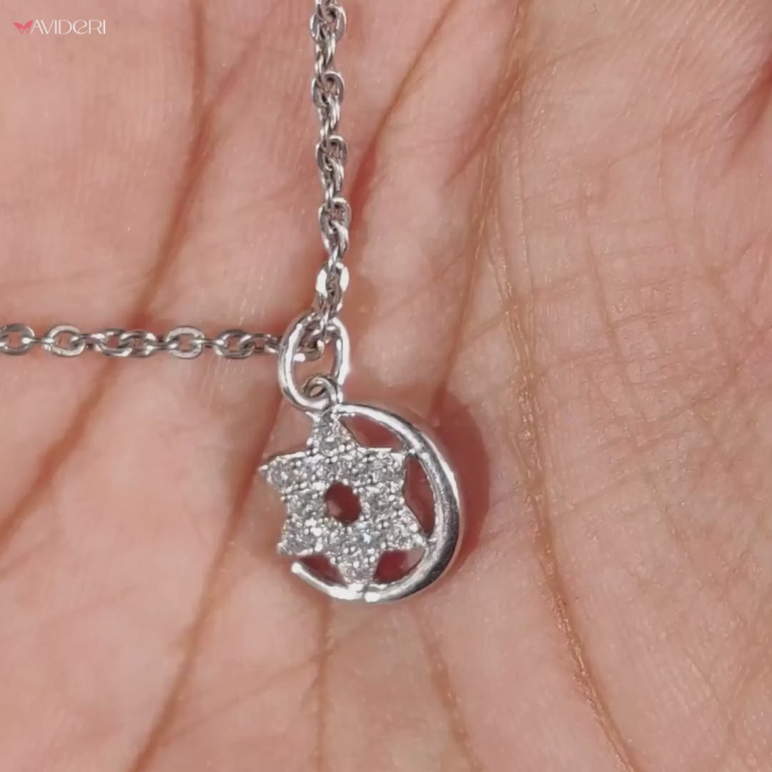 Star and moon pendant crafted in delicate detail