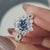 Halo ring setting with brilliant stones encircling the center for extra sparkle.
