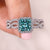 Princess cut bridal set with cyan blue moissanite ring. Princess cut bridal set with cyan blue moissanite ring.