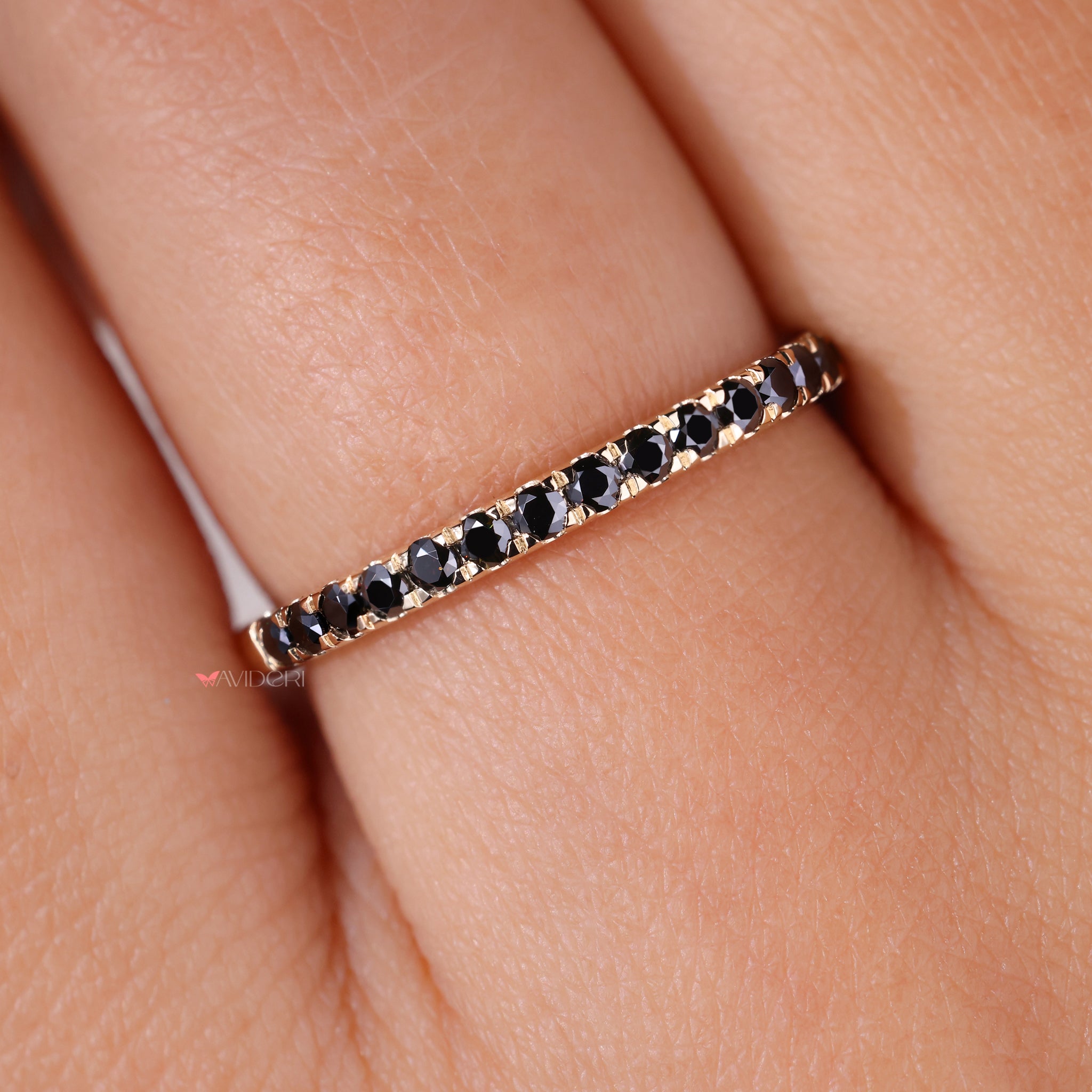 Round eternity band with a prong setting for a secure and elegant fit.