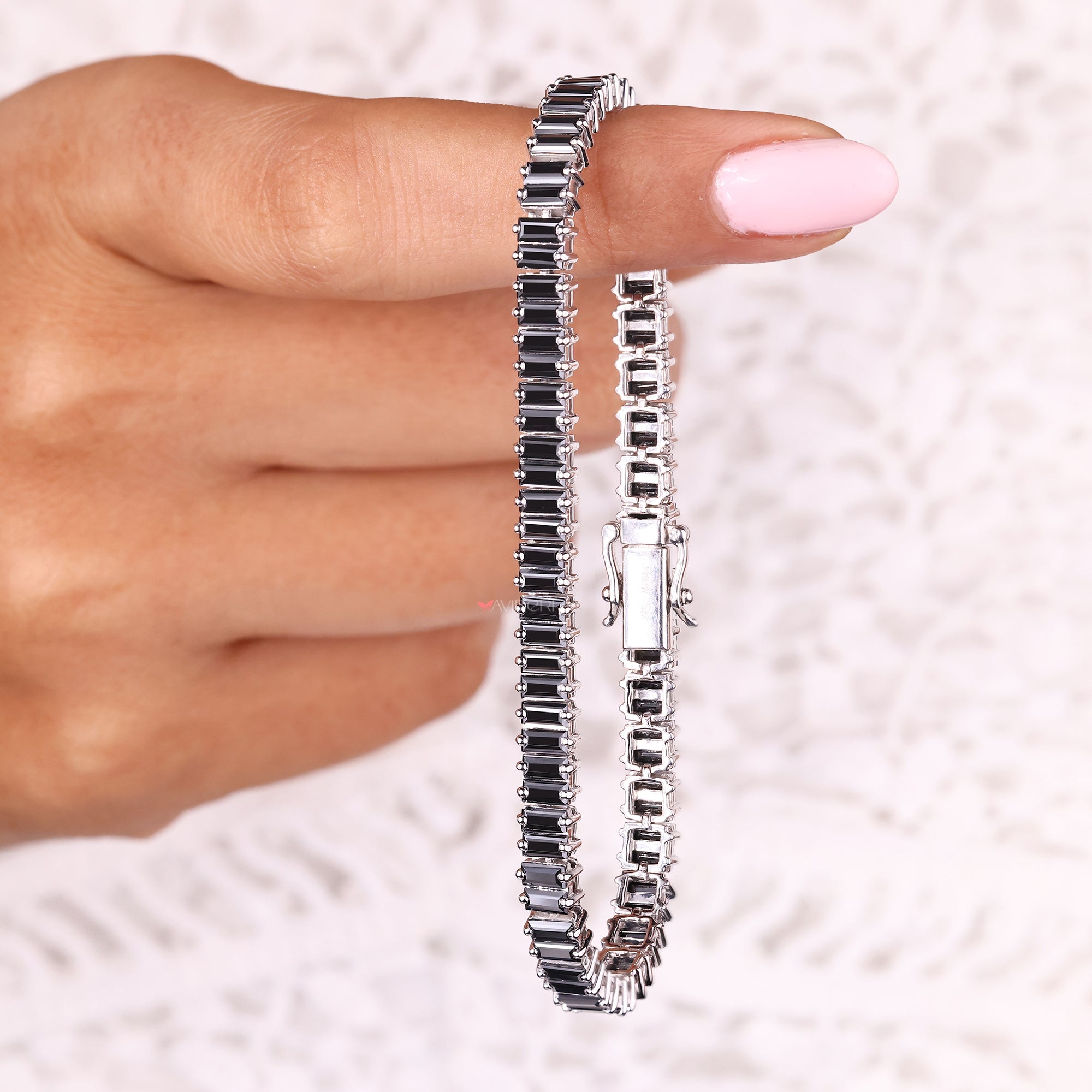 Handmade baguette cut bracelet in moissanite.