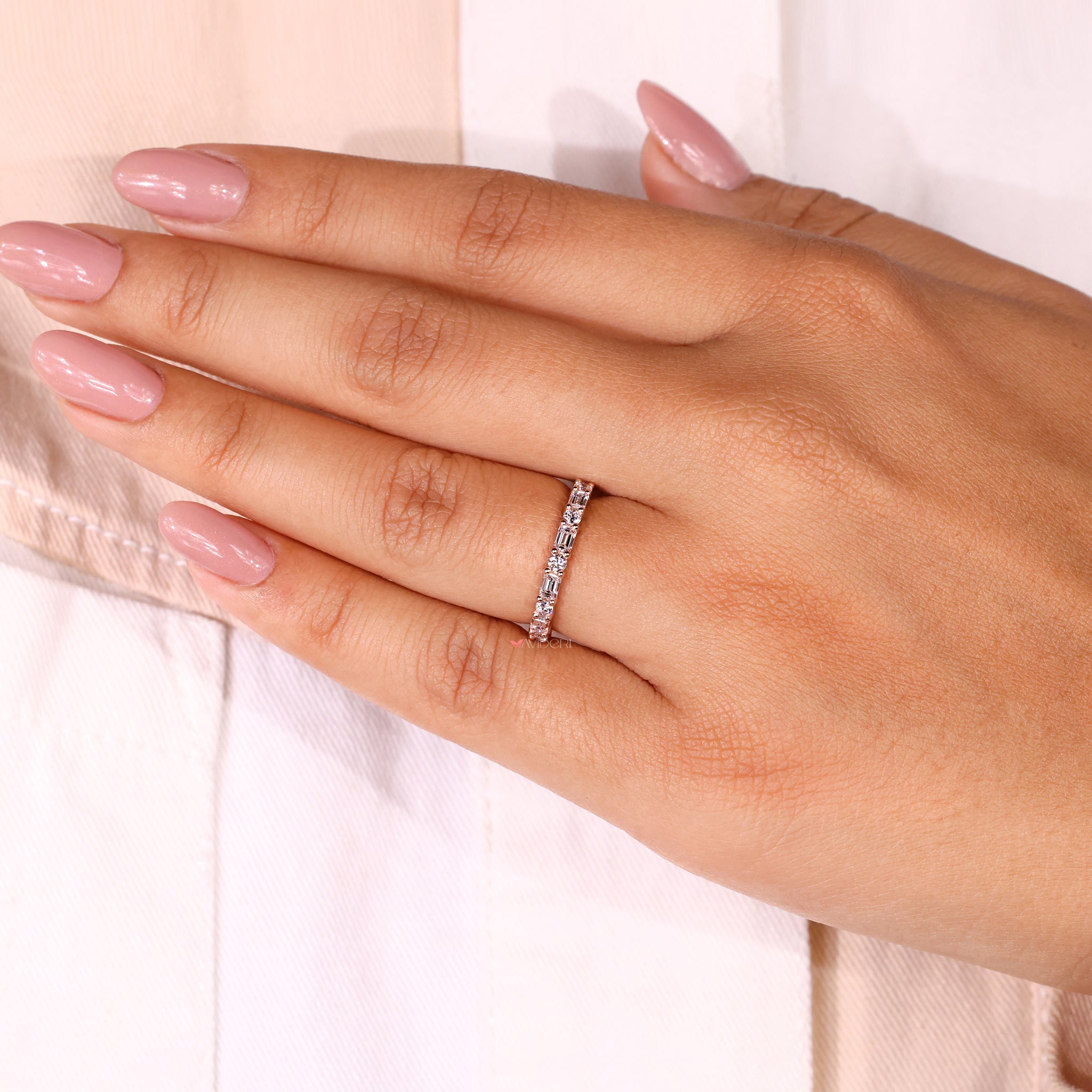 Prong set eternity band with a modern twist on tradition.