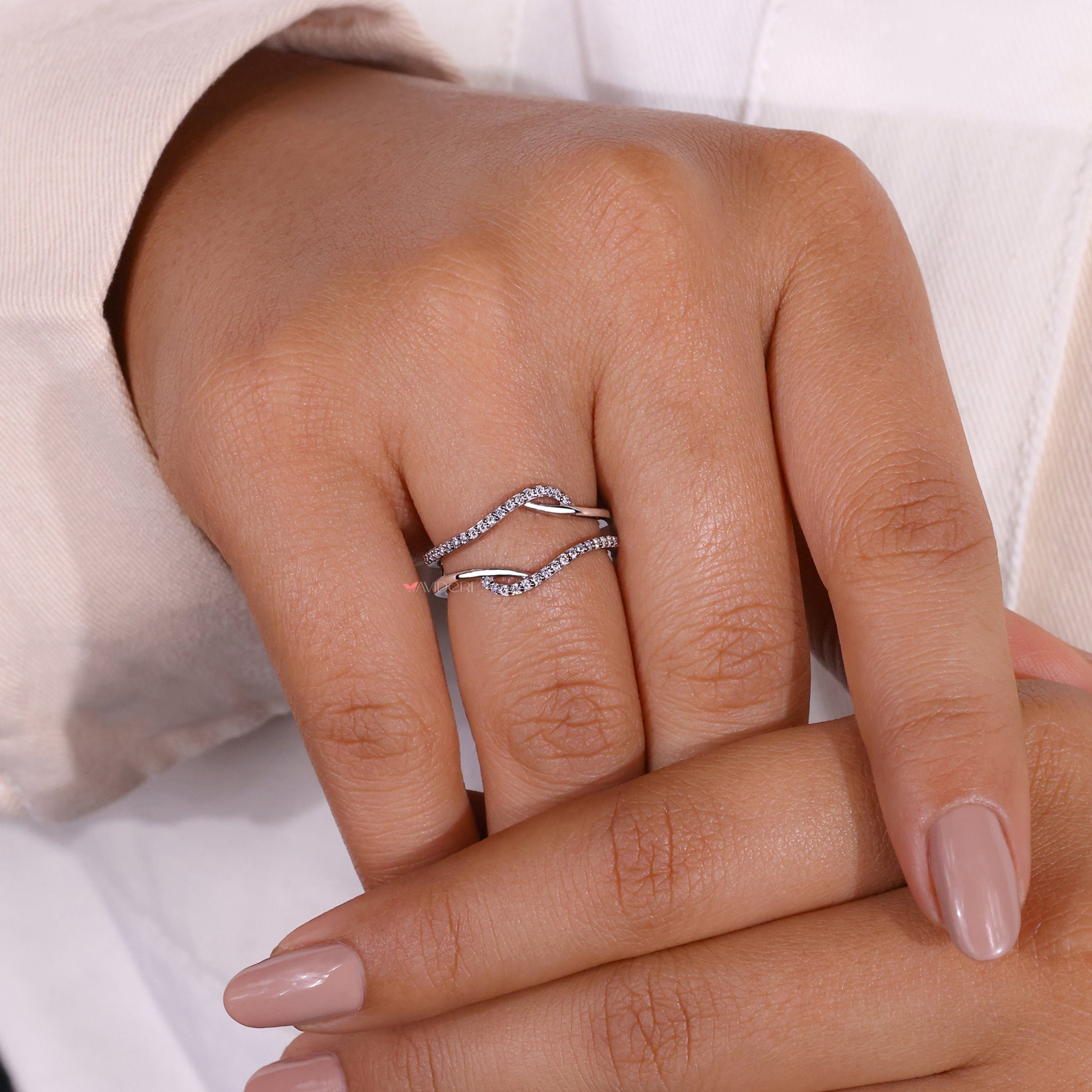 White gold band with prong-set lab diamonds.