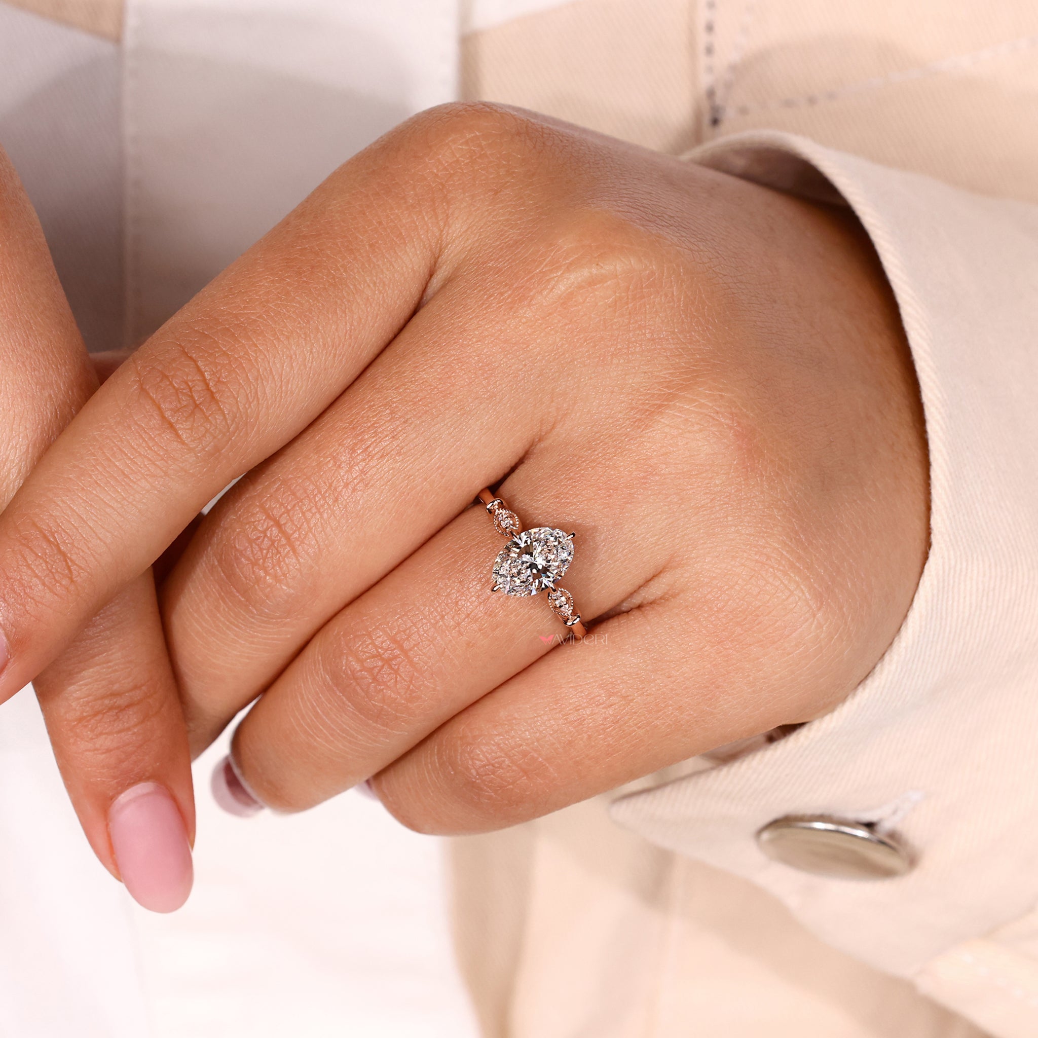 IGI certified oval diamond set in a milgrain ring design, combining classic beauty with modern craftsmanship.