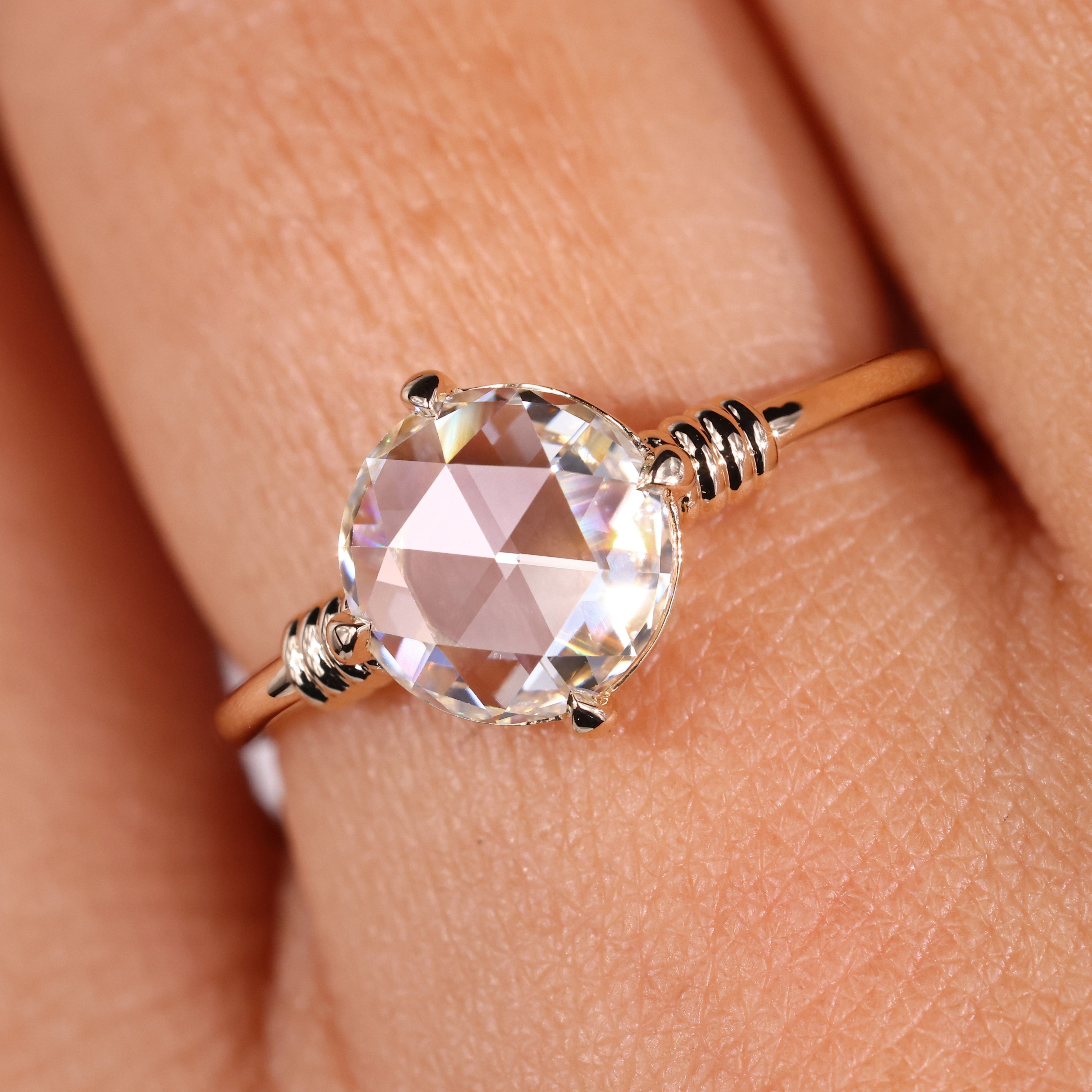 Rose cut diamond ring featuring a stunning round diamond engagement ring design.