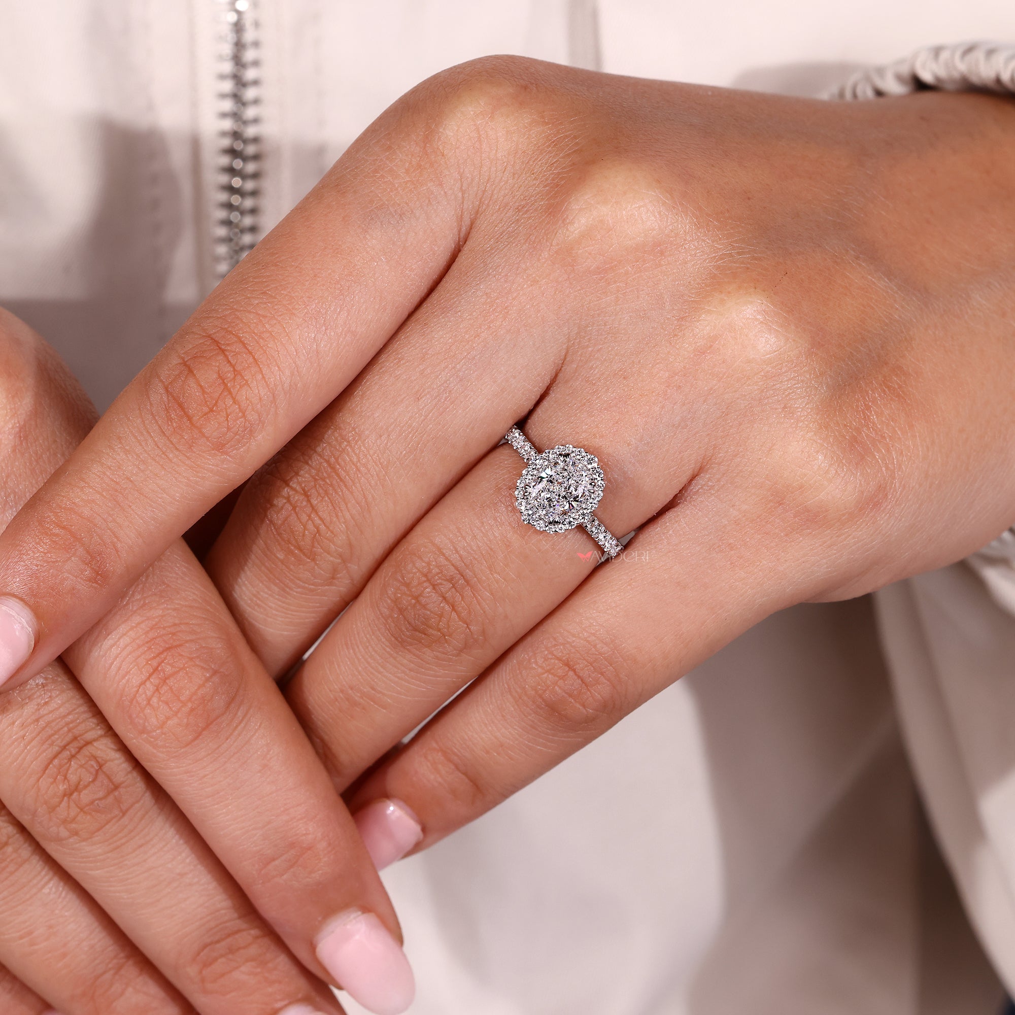 Cathedral setting ring with pave set ring.
