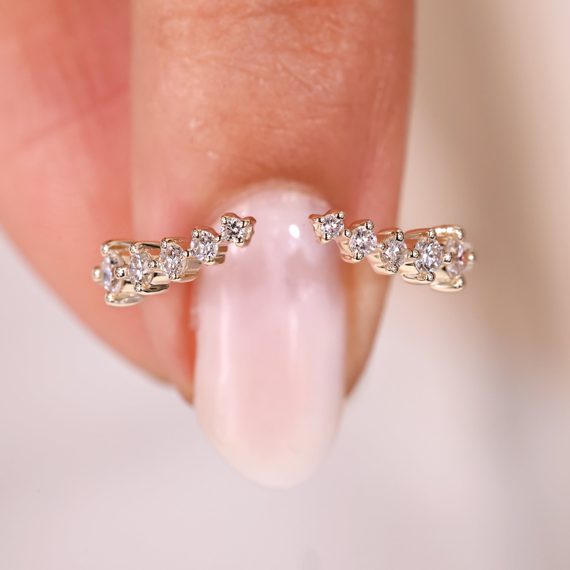 Avideri open gap wedding band with round diamonds.