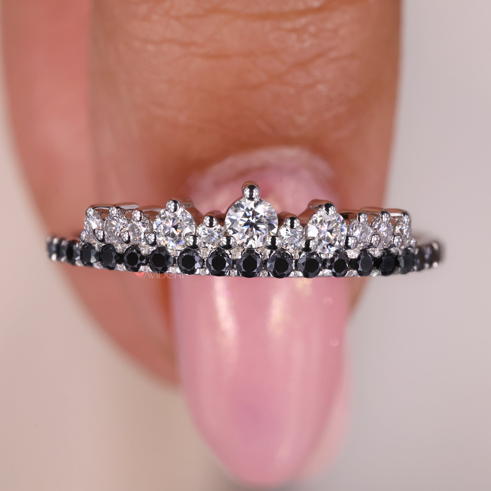 Moissanite wedding band set in a white gold moissanite wedding band.