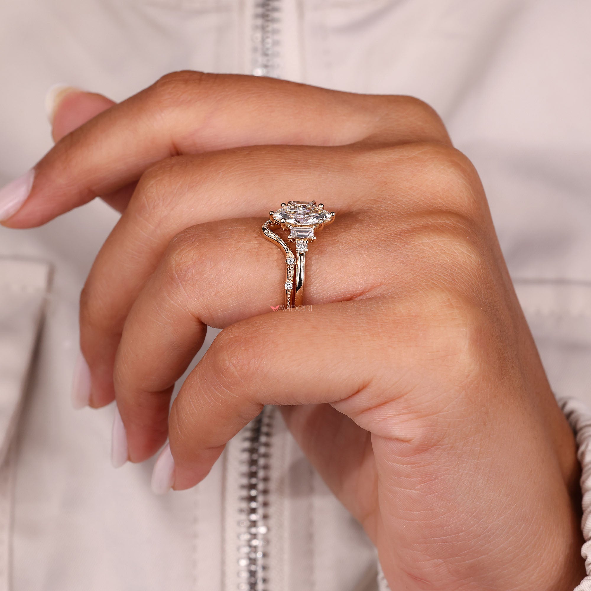 Round cut diamond band completes sets.