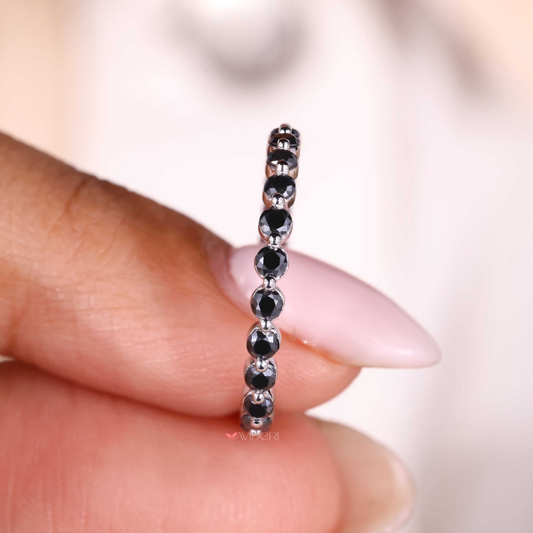 White gold wedding band with a moissanite eternity band for added brilliance.