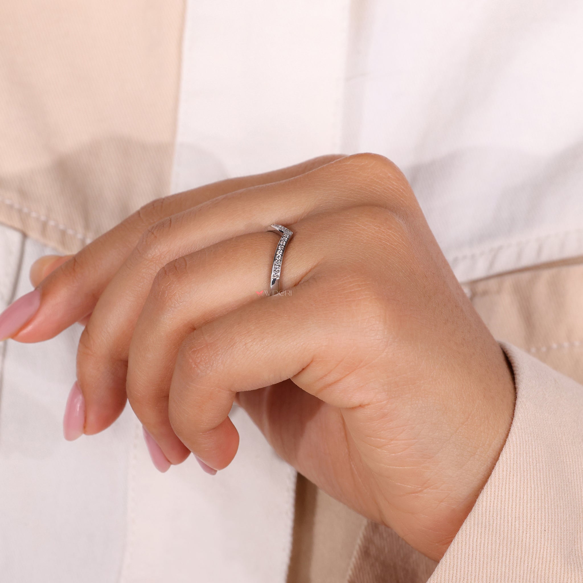 Round stone wedding band with classic charm.