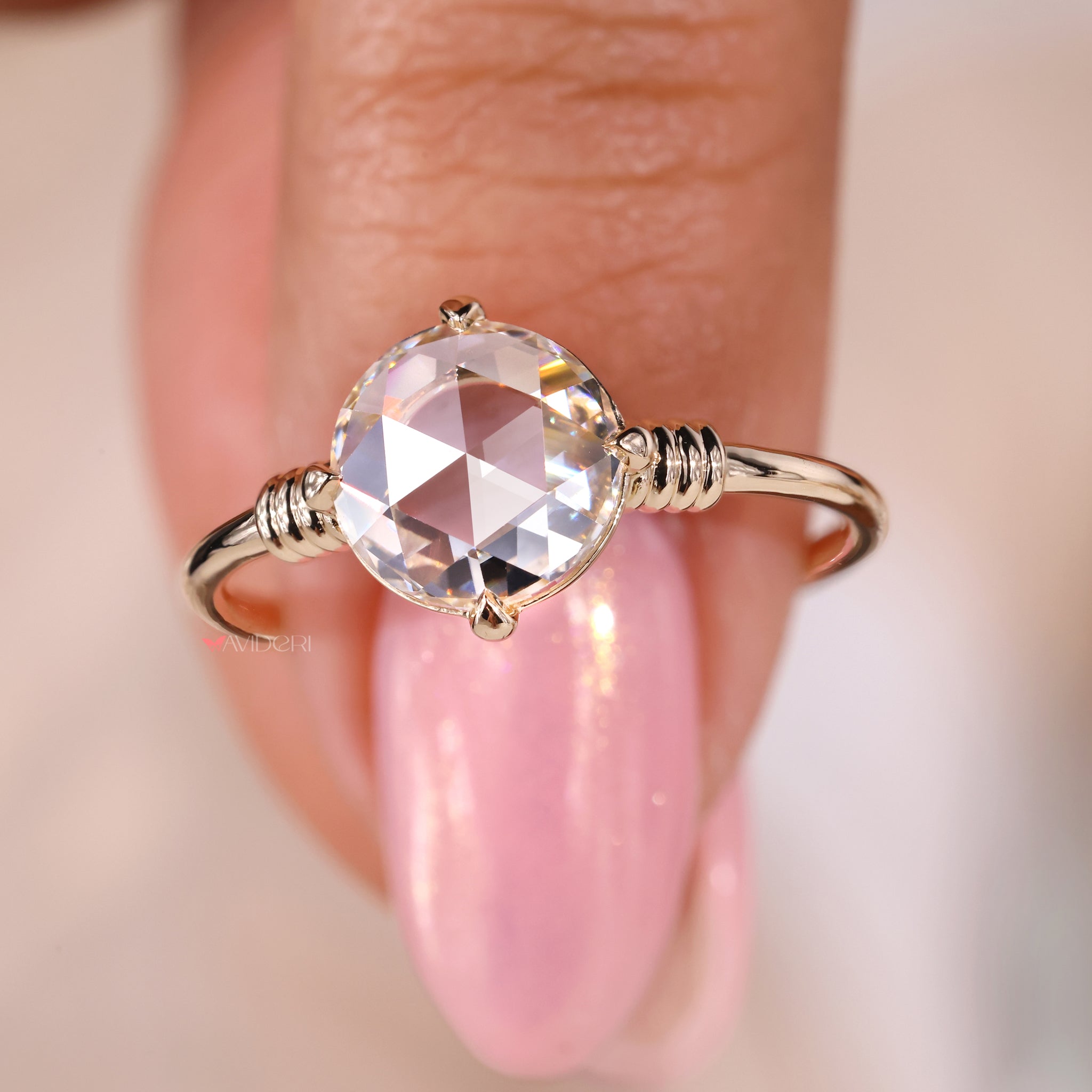 4 prong ring with a rose cut diamond ring for added security and brilliance.