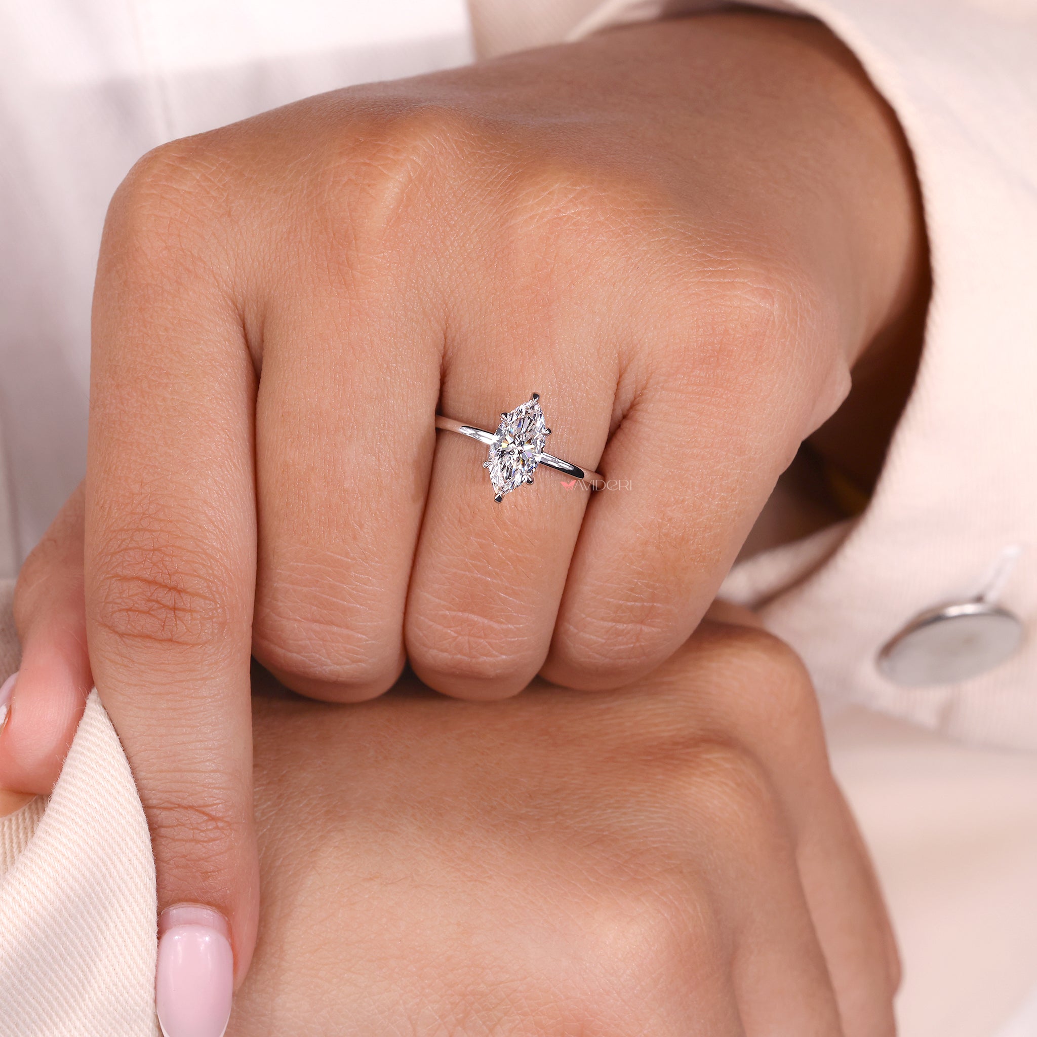 Marquise diamond ring in a white gold band.
