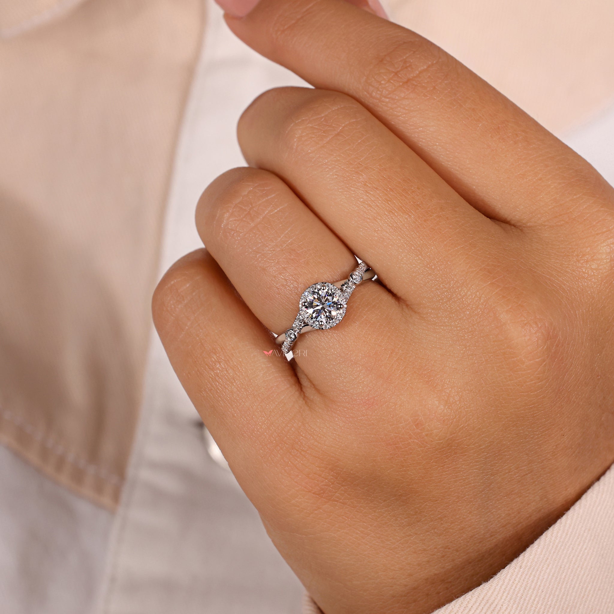 Pave diamond band with an Avideri engagement ring.