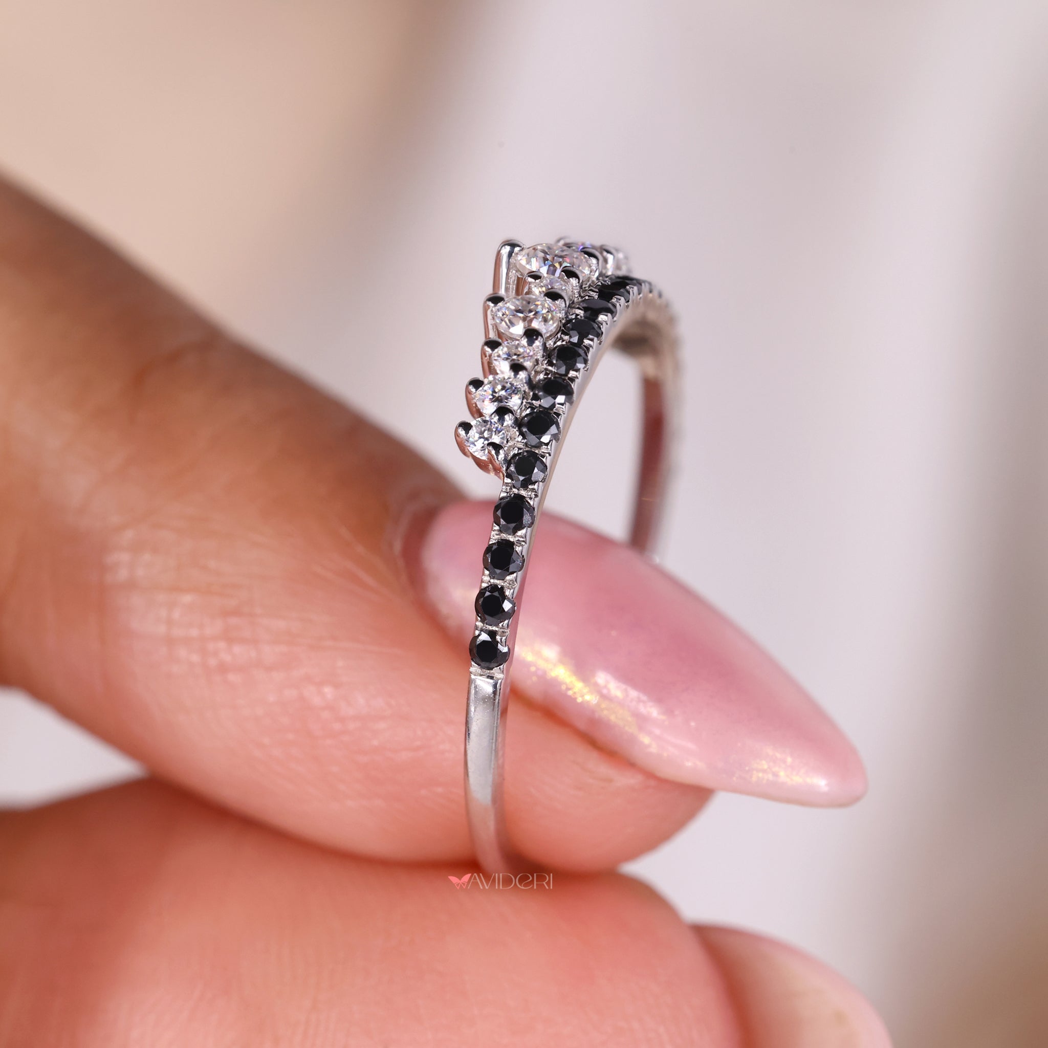 Half eternity band set with moissanite stones in a white gold wedding band.